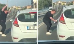 İzmir'de trafikte korku dolu anlar! Yol kesip kadın sürücünün aynasını kırdı