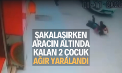 Şakalaşırken aracın altında kalan 2 çocuk ağır yaralandı