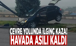 Çevre yolunda ilginç kaza! Havada asılı kaldı