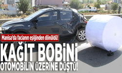 Facianın eşiğinden dönüldü: Kağıt bobini otomobilin üzerine düştü!