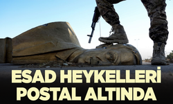 Esad heykelleri postallar altında