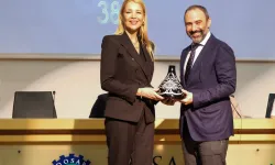 DOSABSİAD'da bayrak Onur Kutlualp'te