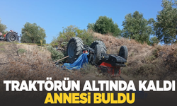 Devrilen traktörün altında can verdi