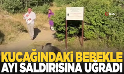 Kucağında bebekle ayı saldırısına uğradı