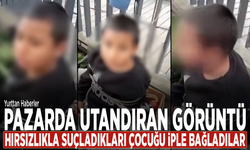 Pazarda utandıran görüntü: Hırsızlıkla suçladıkları çocuğu iple bağladılar