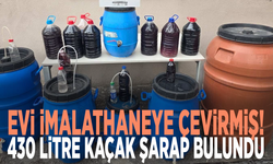 Evi imalathaneye çevirmiş! 430 litre kaçak şarap bulundu