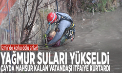 İzmir’de korku dolu anlar! Yağmur suları yükseldi, çayda mahsur kalan vatandaşı itfaiye kurtardı