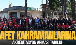 Manisa'da afet kahramanlarına akreditasyon arması takıldı
