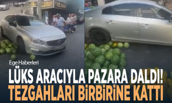 Lüks aracıyla pazara daldı! Tezgahları birbirine kattı