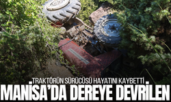 Manisa'da dereye devrilen traktör sürücüsü can verdi