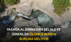 Yasağa aldırmadan şelaleye girenler ölümle burun buruna geliyor