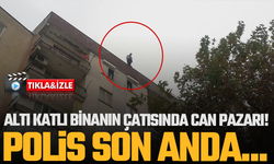 Altı katlı binanın çatısında can pazarı! Polis son anda...