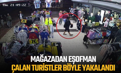 Mağazadan eşofman çalan turistler, taktıkları otelin bilekliği sayesinde yakalandı