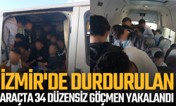 İzmir'de durdurulan araçta 34 düzensiz göçmen yakalandı