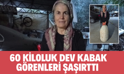 Sarıgöl’de 60 kiloluk dev kabak görenleri şaşırttı
