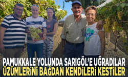 Pamukkale yolunda Sarıgöl’e uğradılar... Üzümlerini bağdan kendileri kestiler