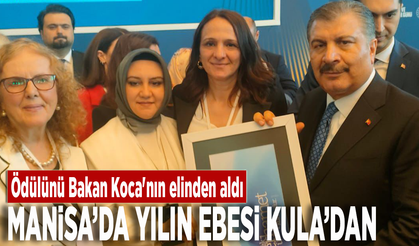 Manisa’da yılın ebesi Kula’dan... Ödülünü Fahrettin Koca'nın elinden aldı