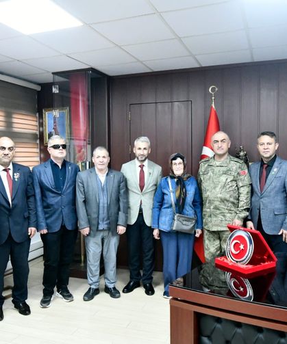 Şehit aileleri ve gazilerden Albay Altınok’a anlamlı ziyaret