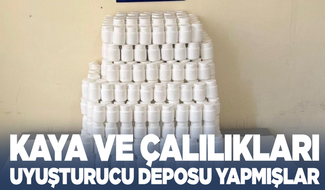 Kayalıkta ve çalılar arasında uyuşturucu deposu