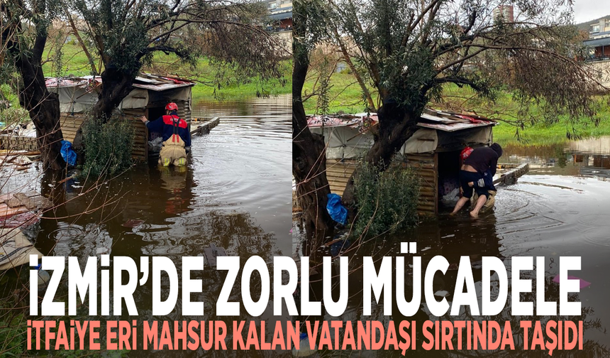 İzmir’de zorlu mücadele: İtfaiye eri mahsur kalan vatandaşı sırtında taşıdı