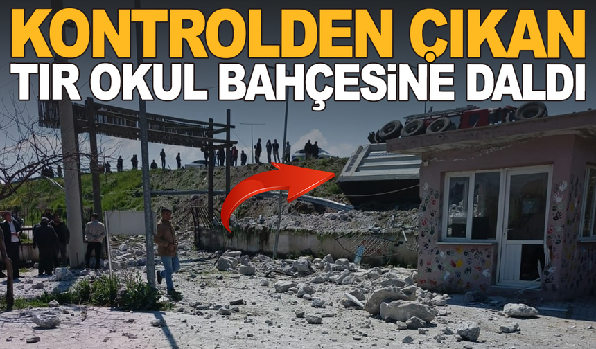 Manisa'da kontrolden çıkan tır okul bahçesine devrildi