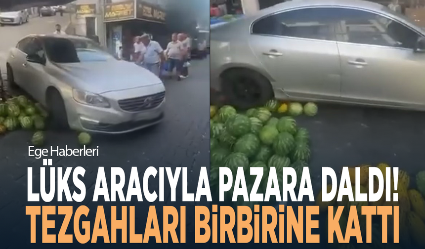 Lüks aracıyla pazara daldı! Tezgahları birbirine kattı