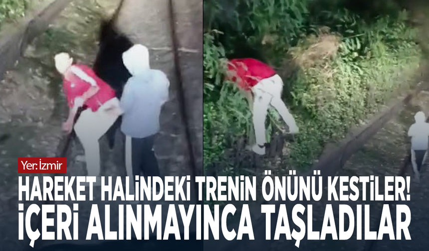 Hareket halindeki trenin önünü kestiler! İçeri alınmayınca taşladılar